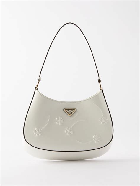 embossed flower prada bag.